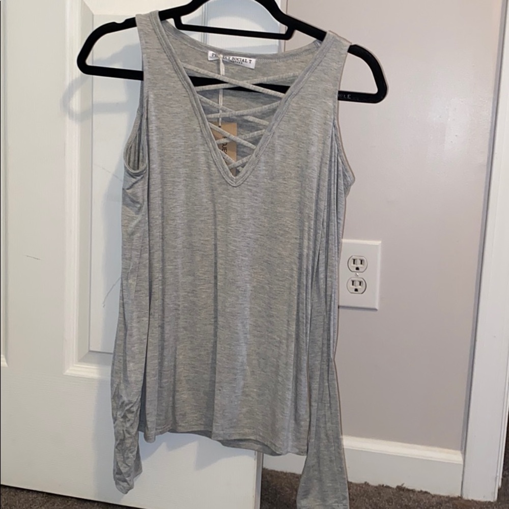 grey top never worn with tags!